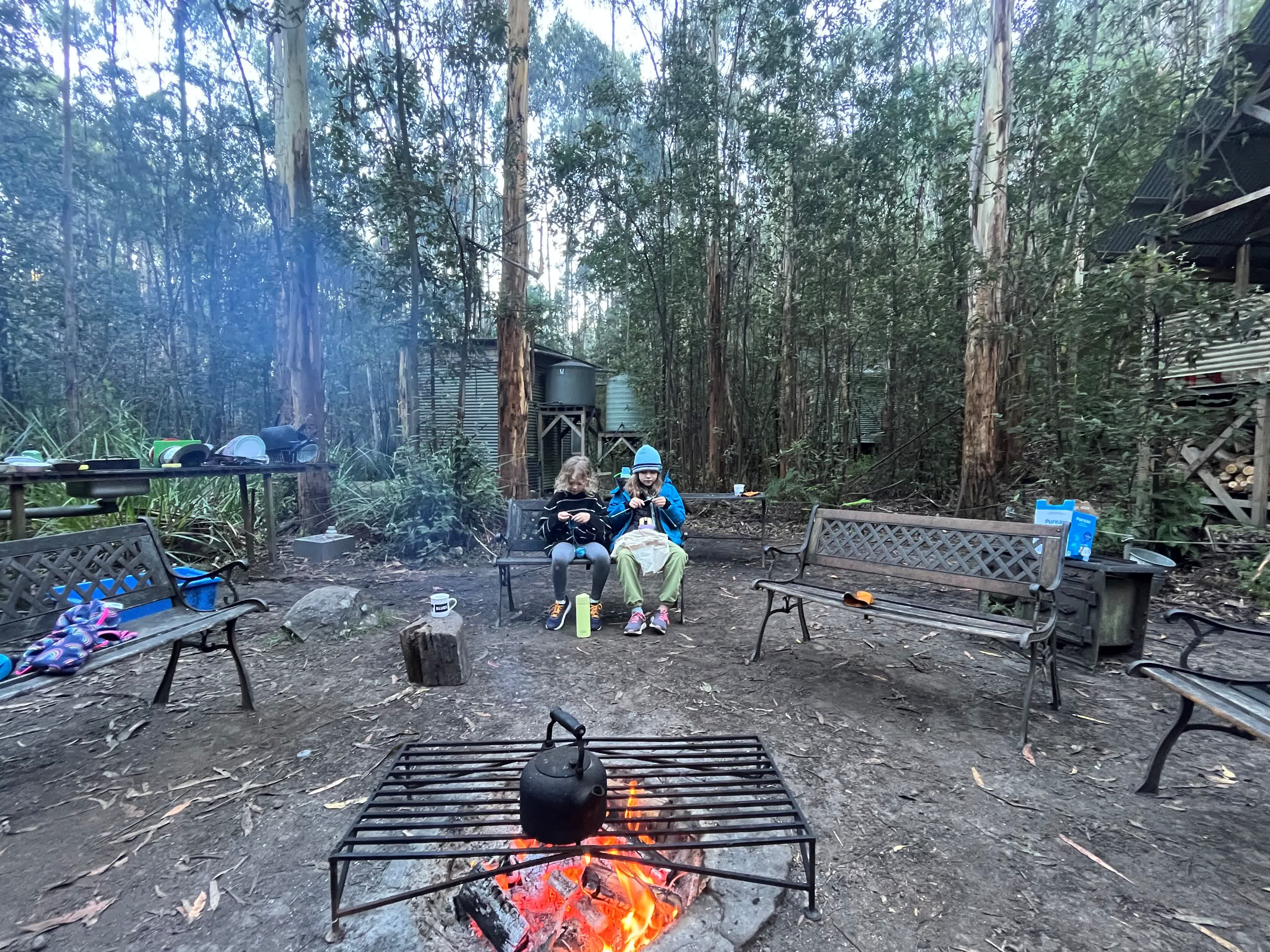 knitting on camp by the fire